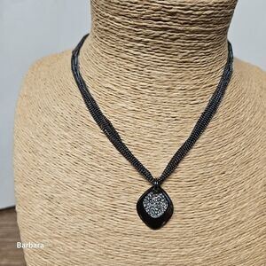 KC (Kenneth Cole) Black Moissanite Encased in Rhodium-plated Pendant Necklace